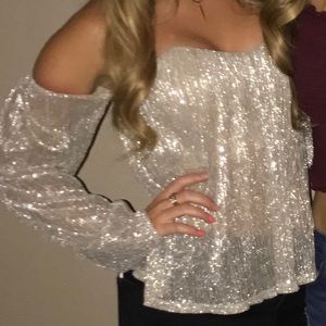 Strapless/long sleeve simmery top